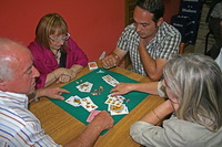 Jugadores y jugadoras de mus